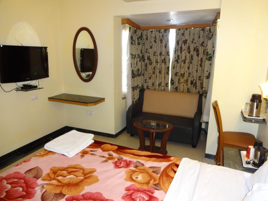 Hotel Nahar Manchester Inn Coimbatore Bilik gambar